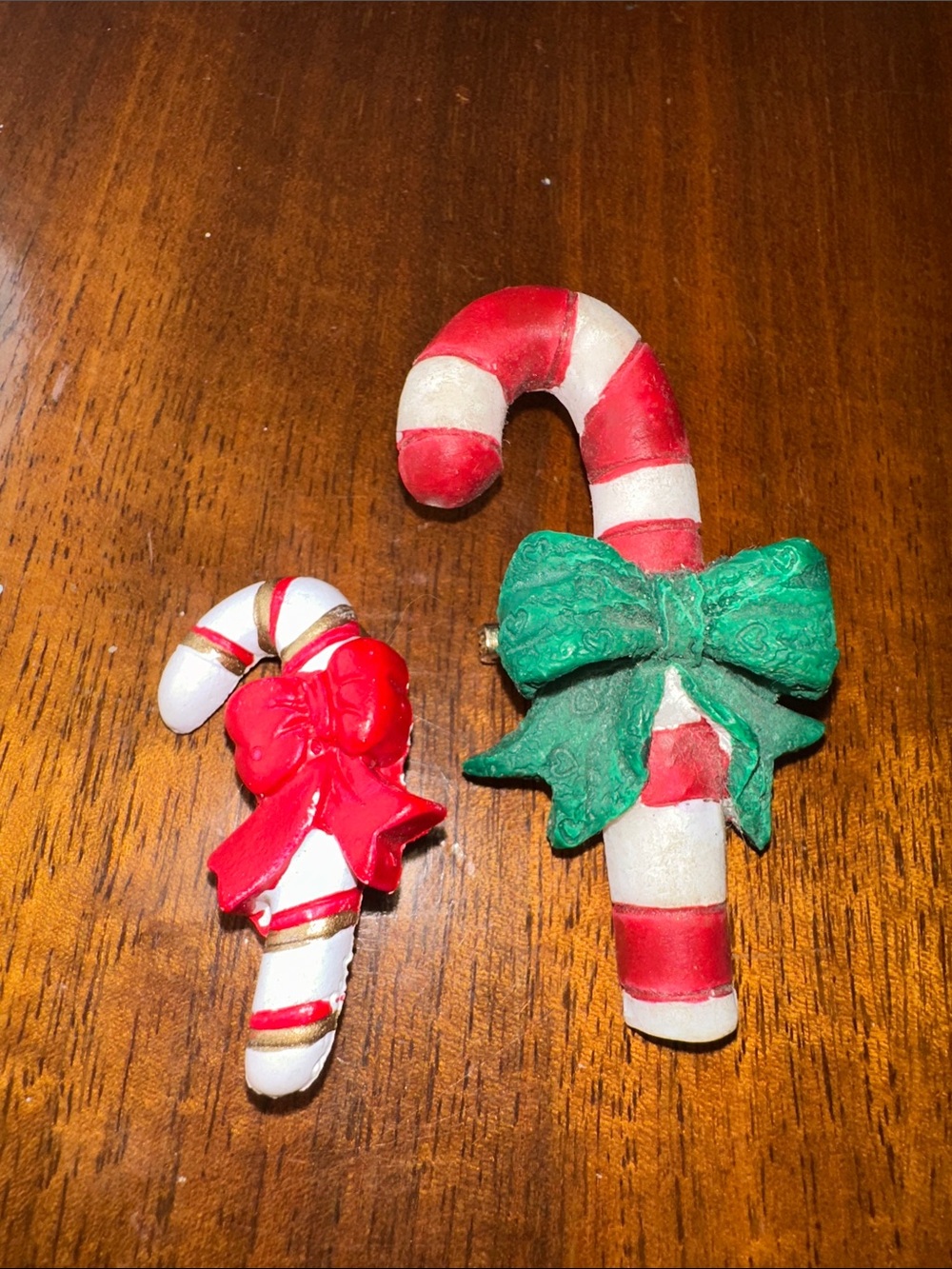 Two Vintage Plastic Resin Holiday Candy Cane Brooch Set in Red, White & Green